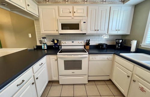 Pensacola Beach Condo | Coastal Condo - just steps to the white sand beach! Ask about our special rates!