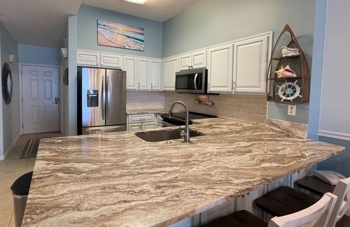 Ono Island Condo | Coastal condo on the sand with ocean views, balcony, pool & hot tub