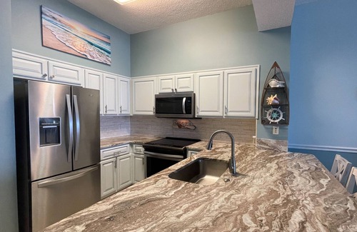 Ono Island Condo | Coastal condo on the sand with ocean views, balcony, pool & hot tub