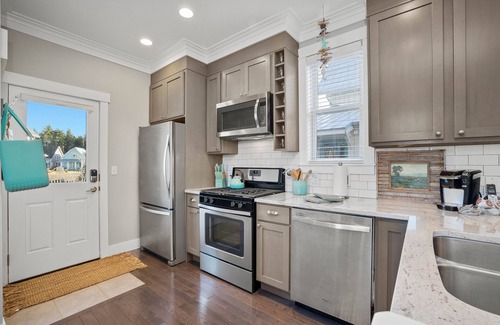 Seabrook House | Coastal Cottage w/Private Hot Tub + Indoor/Outdoor Fireplace + EV Charger