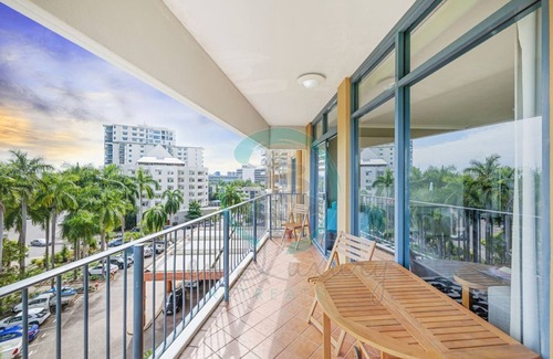 Darwin City Centre Apartment | Coastal Elegance Sunset Pool Balcony Dining