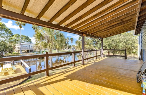 Panacea House | Coastal Getaway on canal-steps to the beach