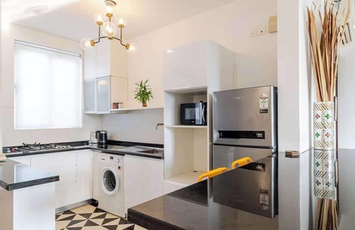 Nerul Apartment | Coastal Grandeur by Da Alohas