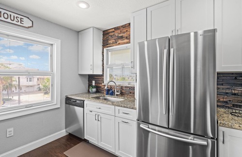 Treasure Island Condo | Coastal living with water views, sunrises, sunsets and boat slip