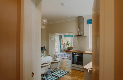 Stranraer Cottage | Coastal Magnificence: Saltwater Chronicles with private sea view deck.