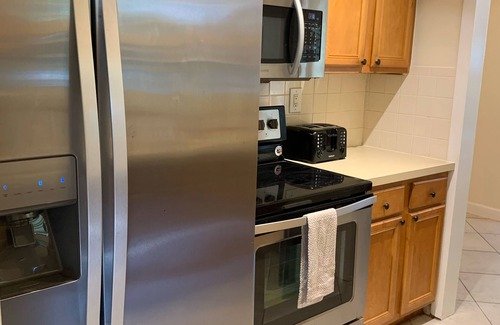 Deerfield Beach Apartment | Coastal Parkside Waterfront Duplex Bungalow- Walk to Beach and Restaurants