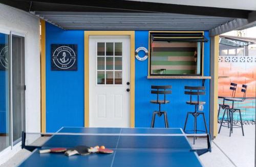 Tempe House | Coastal Retreat Home - Festive Deck with Pool & Beach Bar
