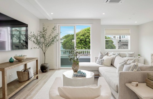 Beach Barber Tract House | Coastal retreat near the beach w/panoramic ocean views, rooftop deck, & firepit