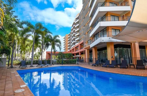Darwin City Centre Apartment | Coastal Splendor Seaview Pool Balcony Dining