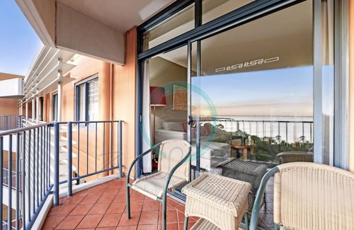 Darwin City Centre Apartment | Coastal Splendor Seaview Pool Balcony Dining