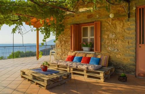 Kitries House | Coastal Stone Residence with Spectacular Scenery