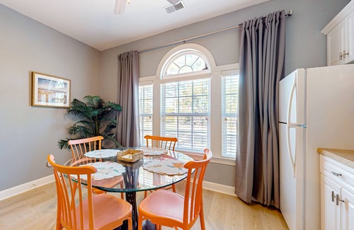 Sea Trail Apartment | Coastal Suite with golf course view and shared pool access