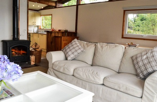 Tighnabruaich Ski Chalet | Cockleshell Lodge located at the waters edge near Otter Ferry-Pet friendly