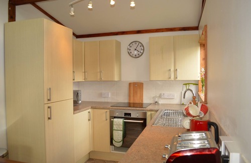 Tighnabruaich Ski Chalet | Cockleshell Lodge located at the waters edge near Otter Ferry-Pet friendly