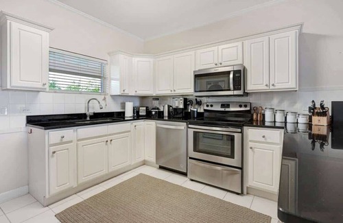 Northwest Point Condo | Coconut Bay Villas #116 - Ocean View 2 BR & Pool