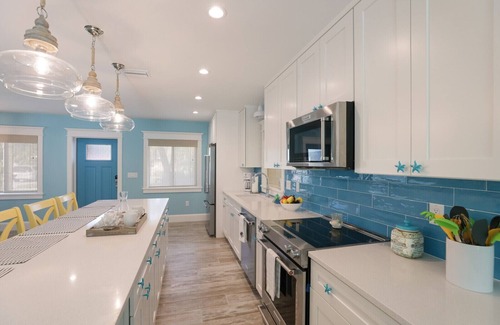 Holmes Beach House | Coconut Cottage: Pool & Spa,1 Block to Beach by Anna Maria Life Vacation Rentals