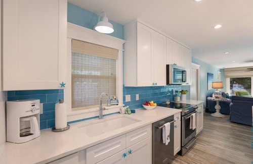 Holmes Beach House | Coconut Cottage: Pool & Spa,1 Block to Beach by Anna Maria Life Vacation Rentals