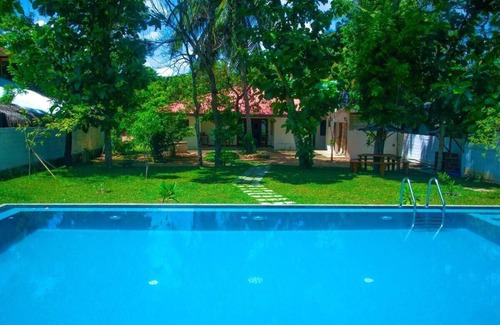 Inamaluwa Villa | Colonial 4-Bedroom Villa with Swimming Pool, A/C & WiFi Near Sigiriya Rock