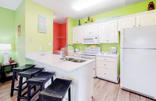 Gulf Shores House | Colorful Duplex Apartment w/Porch, WiFi & Central AC - Walk to the Beach