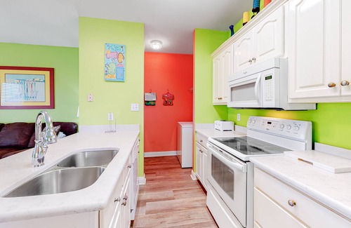 Gulf Shores House | Colorful Duplex Apartment w/Porch, WiFi & Central AC - Walk to the Beach