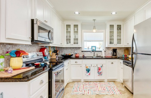 Port Bolivar House | Colorful Gulf view home with wraparound deck and AC - walking distance to beach