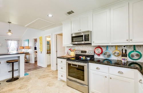 Port Bolivar House | Colorful Gulf view home with wraparound deck and AC - walking distance to beach