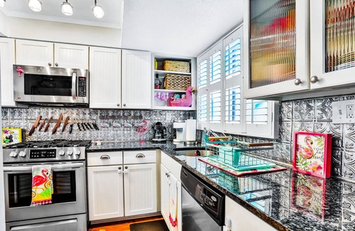 New Smyrna Beach House | Colorful, Snowbird-Friendly Townhouse with Fast WiFi, Central AC, & Washer/Dryer