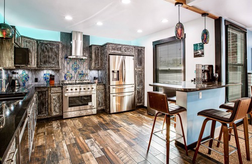 Brighton House | Colorfully renovated home with WiFi, fireplace, deck, patio, grill, & firepit