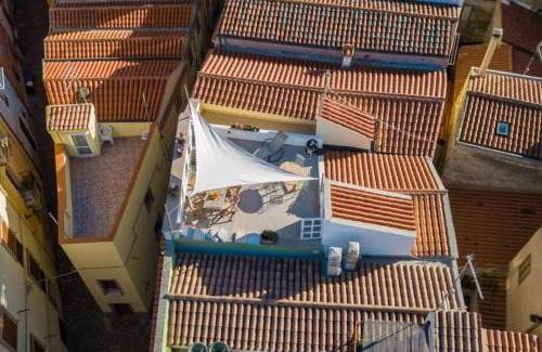 Bosa Historic Centre Apartment | Colours in the street