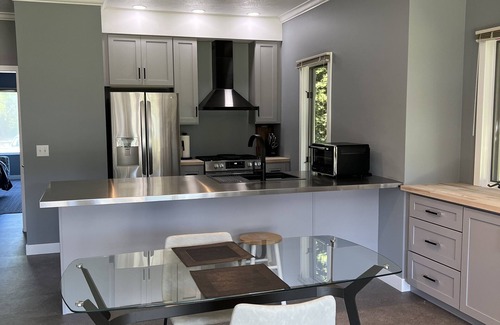 Cedar Condo | Come cozy up next to the fireplace at our contemporary condo centrally located