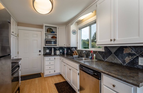 Camano Island House | Come for the Birdseye view of water, whales, mountains and more - stay to relax.