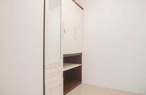 East Jakarta Apartment | Comfort 1BR Apartment with Study Room at Woodland Park Residence By Travelio