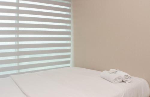 Pekayon Jaya Apartment | Comfort 2BR at Grand Kamala Lagoon Apartment By Travelio