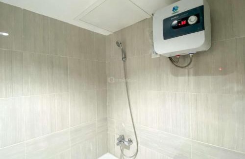 Cikarang Apartment | Comfort and Simply Design Studio at Vasanta Innopark Apartment By Travelio