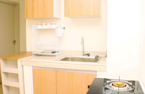 Cikarang Apartment | Comfort and Well Design 2BR with Working Room at Meikarta Apartment By Travelio