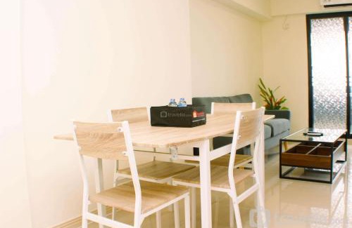 Cikarang Apartment | Comfort and Well Design 2BR with Working Room at Meikarta Apartment By Travelio