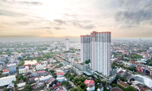 Makassar Apartment | Comfort Studio Apartment Vida View Makassar By Travelio