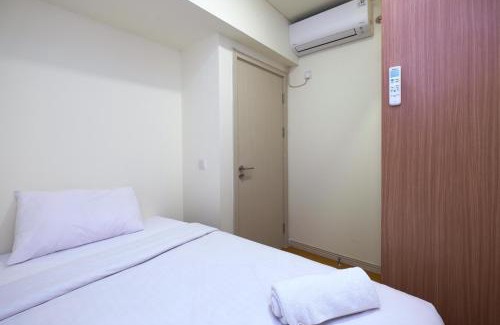 Cikarang Apartment | Comfortable 2BR with Workspace at Meikarta Apartment By Travelio