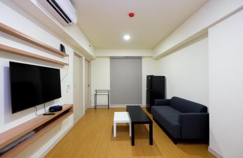 Cikarang Apartment | Comfortable 2BR with Workspace at Meikarta Apartment By Travelio