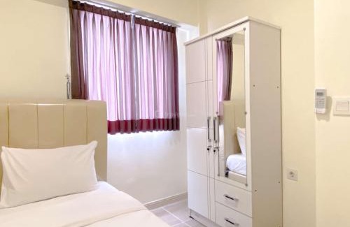 Cikarang Apartment | Comfortable 2BR with Working Room at Meikarta Apartment By Travelio