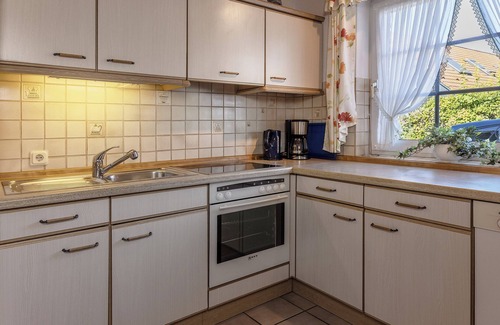 Harlesiel House | Comfortable and idyllic: The mid-terrace house with its 65 square meters located behind de