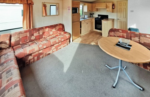 Ludchurch House | Comfortable and spacious 12ft-wide caravan with one double and two twin.
