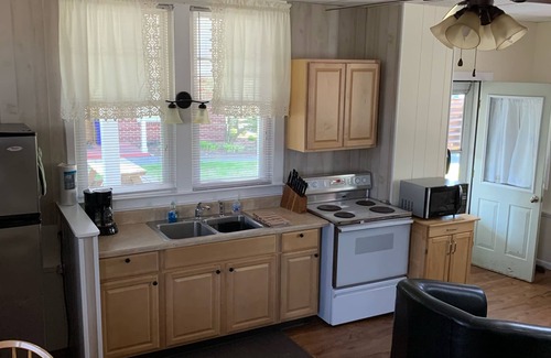 Lake George House | Comfortable Boardwalk Cottage Within Walking Distance of Lake, Beach and Village