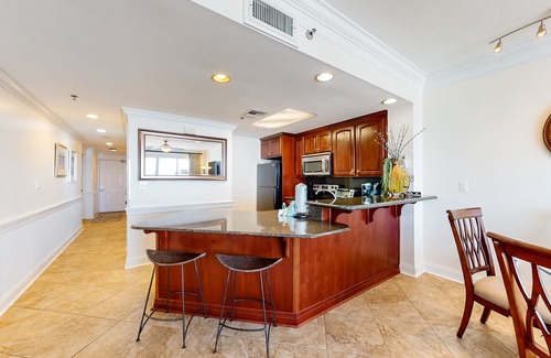 Destin Condo | Comfortable condo just steps from the beach with pool & fitness room