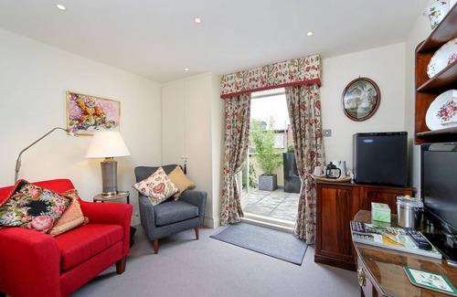 Munster Bed & Breakfast | Comfortable double bedroom with ensuite bathroom, sitting room & roof terrace