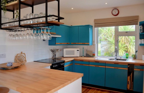 Trebetherick House | Comfortable family house with open plan kitchen/diner, sitting room & 4 bedrooms