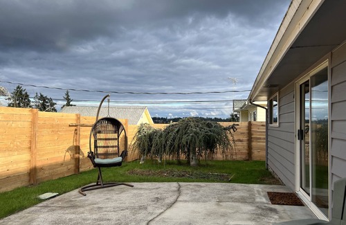 Silverdale House | Comfortable family retreat with fireplace, views and game room.