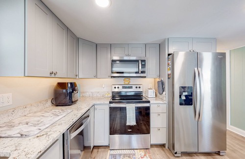Montego Bay House | Comfortable home near beach with screened porch, pool, tennis, & mini-golf