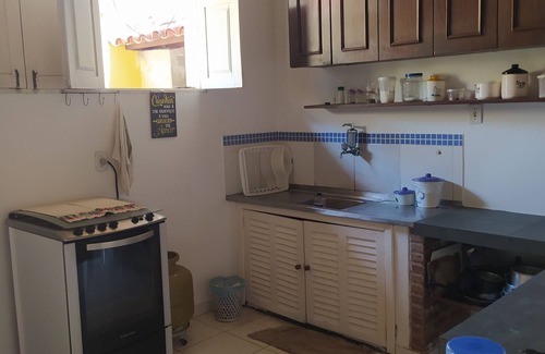Sao Francisco House | Comfortable house with balcony and barbecue, avenue close to the sea