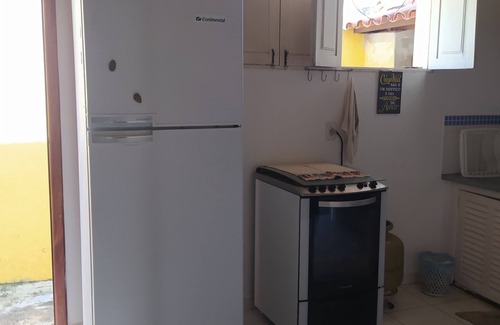 Sao Francisco House | Comfortable house with balcony and barbecue, avenue close to the sea